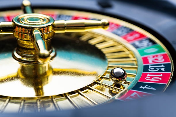 Live dealer and slot game display on a mobile gaming screen